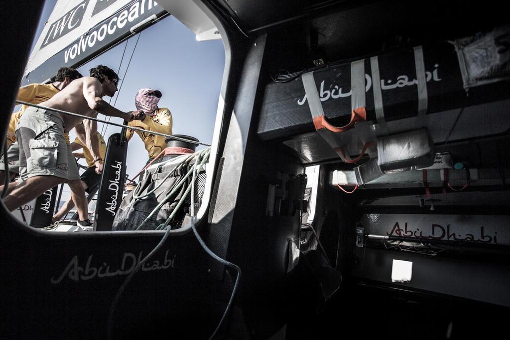 January 5, 2015. Leg 3 onboard Abu Dhabi Ocean Racing. Adil Khalid and Daryl Wislang grind through yet another gybe as 