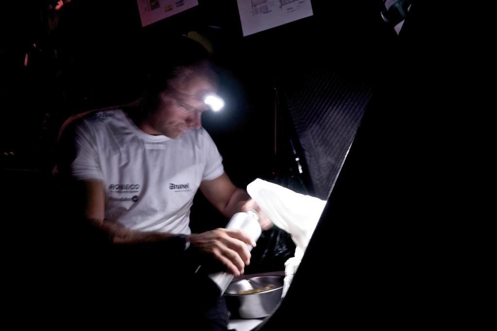 January, 2015. Leg 3 onboard Team Brunel. Gerd-Jan Poortman prepares himself some dinner © Volvo Ocean Race http://www.volvooceanrace.com