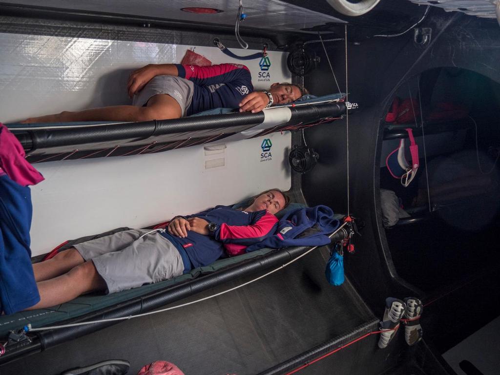 January 5, 2015. Leg 3 onboard Team SCA. Dee Caffari and Stacey Jackson take a much needed rest after three days of little to no sleep. © Volvo Ocean Race http://www.volvooceanrace.com