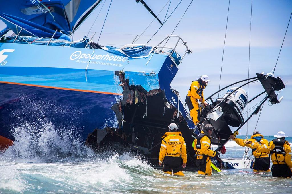 November 30, 2014. Team Vestas Wind's boat grounded on the Cargados Carajos Shoals, Mauritius, in the Indian Ocean. Fortunately, no one has been injured. In this image, the crew head back to the boat to retrieve everything they can; including ropes, diesel, Inmarsat dome and sails. photo copyright Brian Carlin - Team Vestas Wind taken at  and featuring the  class