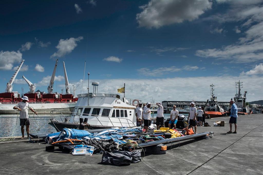 December 03, 2014. Team Vestas Wind crew arrives to Mauritius with all the equipment they rescued from the boat after grounding on the Cargados Carajos Shoals on the 29th November photo copyright  Marc Bow / Volvo Ocean Race taken at  and featuring the  class