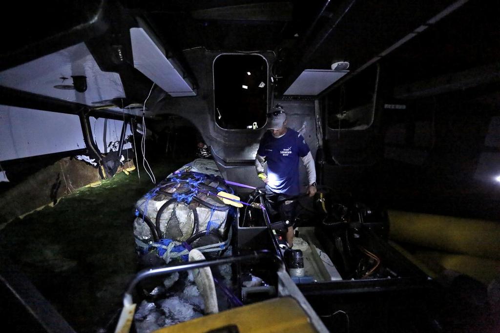 December 19, 2014. Neil Cox inside the boat at the beginning of the Team Vestas Wind salvage operation. © Shane Smart/Volvo Ocean Race http://www.volvooceanrace.com