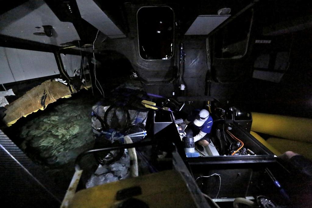 December 19, 2014. Neil Cox inside the boat at the beginning of the Team Vestas Wind salvage operation. © Shane Smart/Volvo Ocean Race http://www.volvooceanrace.com