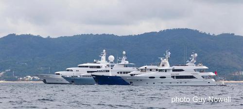 m/y line up - (l to r) Titania, Samax, Northern Sun, Moon Sand. Asia Superyacht Rendezvous 2014 © Guy Nowell http://www.guynowell.com