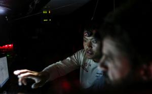 Leg Two, Day 19 - Black and Pascal onboard - Black is a curious person, always wanting to learn onboard Dongfeng  - Volvo Ocean Race 2014-15. photo copyright Yann Riou / Dongfeng Race Team taken at  and featuring the  class