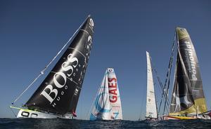 The Barcelona World Race 2014-2015. Picture from the race start today - Hugo Boss IMOCA Open 60 skippered by Alex Thomson (GBR) with Co skipper Pepe Ribes (ESP). photo copyright Lloyd Images taken at  and featuring the  class