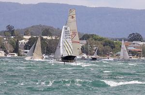 Former Moth World Champion, Josh McKnight, gets away in a mixed fleet on Lake Macquarie. photo copyright  John Curnow taken at  and featuring the  class