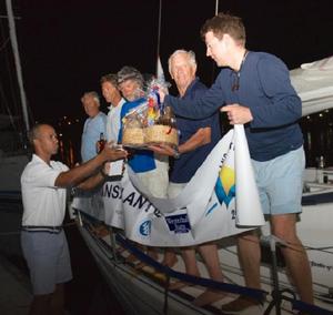 Warm welcome to the spice island of Grenada and a welcome basket of local goodies for the crew of Optim'X - RORC Transatlantic Race 2014. photo copyright RORC/Arthur Daniel and Orlando K Romain taken at  and featuring the  class