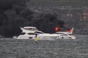  Boat fire Sydney harbour November 19, 2014 photo copyright Beth Morley - Sport Sailing Photography http://www.sportsailingphotography.com taken at  and featuring the  class