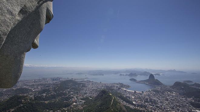 The Christ Redeemer statue, left, overlooks Guanabara bay in Rio de Janeiro, Brazil - Rio 2016 Olympics © SW