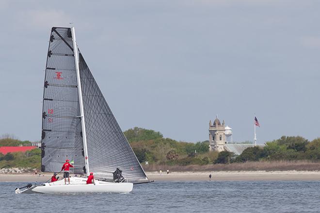 Many competitors at Sperry Top-Sider Charleston Race Week hail from the cold Midwest, and Todd and Ryan Howe from Rochester, NY are no exception the experienced multihull racers and their Farrier F-25C Panic Button won their class with all bullets. Here they pass the historic Sullivan’s Island landmark Stella Maris Church. © Meredith Block/ Charleston Race Week http://www.charlestonraceweek.com/