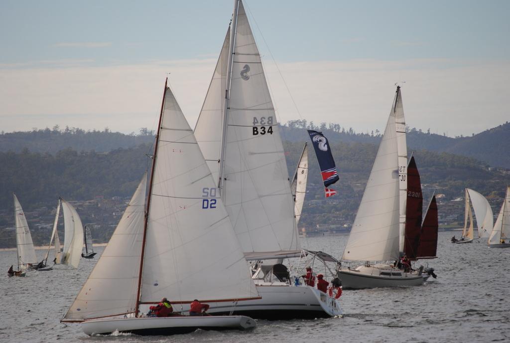 The veteran Derwent classer Gnome wins the start in its division of the opening day of the Derwent Sailing Squadron's Autumn Two-Handed Series. - Derwent Sailing Squadron’s Quantum Autumn Two-Handed Series 2014 photo copyright Peter Campbell taken at  and featuring the  class