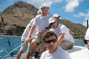 Karol Jablonski helming on IRC 52 Near Miss - Les Voiles de St Barth photo copyright Christophe Jouany / Les Voiles de St. Barth http://www.lesvoilesdesaintbarth.com/ taken at  and featuring the  class