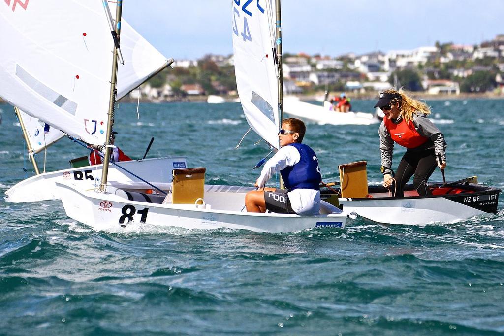 Lewis Anderson (81) and Kerensa Jennings (astern) - Day 5, 2014 Toyota Optimist Championships, Manly SC © Richard Gladwell www.photosport.co.nz