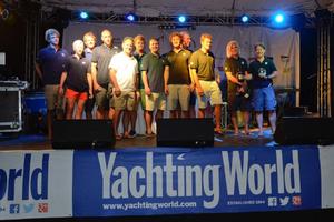 Karl Funks Kernan 47, True collect the spoils for winning the Yachting World Round Antigua Race photo copyright Ted Martin taken at  and featuring the  class