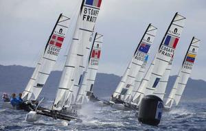 Nacra 17 fleet action at the 2014 ISAF Sailing World Cup Hyeres photo copyright Franck Socha taken at  and featuring the  class
