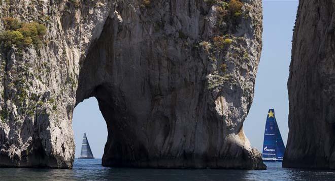 2014 Rolex Capri Sailing Week - Esimit Europa 2 was first to pass the famous Faraglioni Islands. ©  Rolex / Carlo Borlenghi http://www.carloborlenghi.net