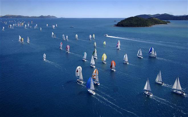 Tropical pleasure: the fleet at Audi Hamilton Island Race Week stretches out across the Whitsunday Passage  © Jack Atley