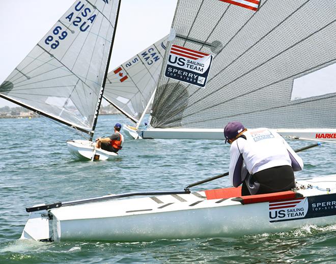 Caleb Paine (r.) hails Greg Douglas (c.) and Rob Hemming (l.) about their oversight - Finn Class North American Championships 2014 © Rich Roberts