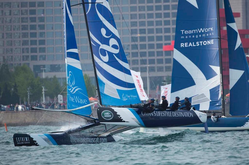 The Wave, Muscat fly a hull as they battle the rough sea state on day 3 in Qingdao - 2014 Extreme Sailing Series Act 3 photo copyright Lloyd Images/Extreme Sailing Series taken at  and featuring the  class
