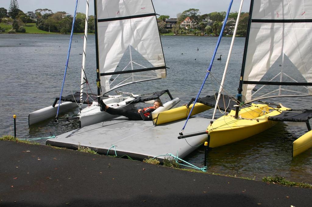 Chilling on the dock - Weta Sailing on Lake Pupuke photo copyright Miranda Powrie taken at  and featuring the  class