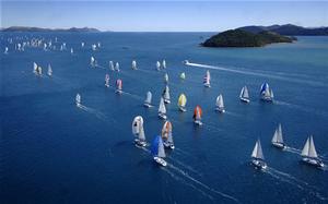 Tropical pleasure: the fleet at Audi Hamilton Island Race Week stretches out across the Whitsunday Passage photo copyright Jack Atley taken at  and featuring the  class