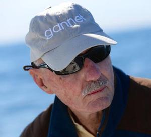 Webb Chiles aboard his Moore 24 ``GANNET,`` sailing out of San Diego's Quivira Basin in February of 2014.  

Photograph by: 
Steve Earley
steve.earley@verizon.net
757 406-3617

313 Downing Drive
Chesapake, VA  23322
 photo copyright  SW taken at  and featuring the  class