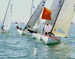 Henry Sprague leads the fleet off the start line - Finn class North American Championships 2014 photo copyright Rich Roberts taken at  and featuring the  class