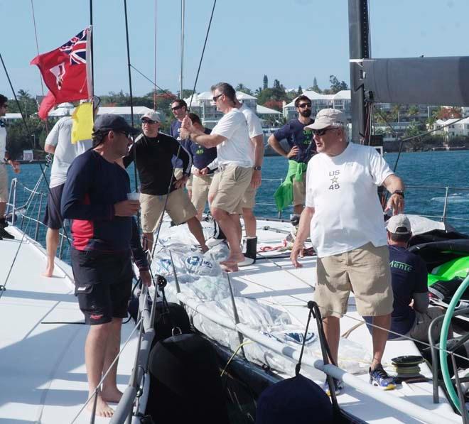 Hap Fauth (right)  owner of second placed yacht Bella Mente, congratulates George Sakellaris, owner of the first to finish yacht Shockwave on arrival at the Royal Bermuda YC dock. Shockwave crossed the St David's Lighthouse finish line to take line honours for the 2014 Newport Bermuda Race 7 minutes ahead of rival mini maxi Bella Mente with a time of  2days 15 hours 24 mins, 11 secs. © Barry Pickthall/PPL http://www.pplmedia.com