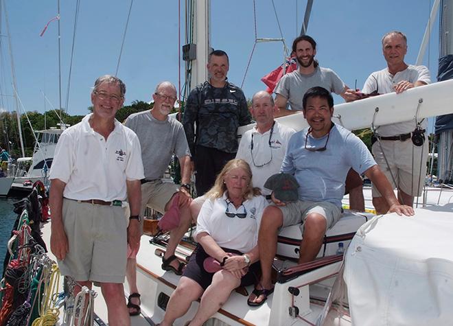 Crew of Actaea, the Hinckley Bermuda 40 yawl, winner of the St David's Lighthouse trophy. Left`; skipper, Michael Core, and Connie Core (sitting). John Chiochetti, James Dalton, Geroge JFallon, Rex Mlyashio, Stewart Rose and William Sneath. © Barry Pickthall / PPL