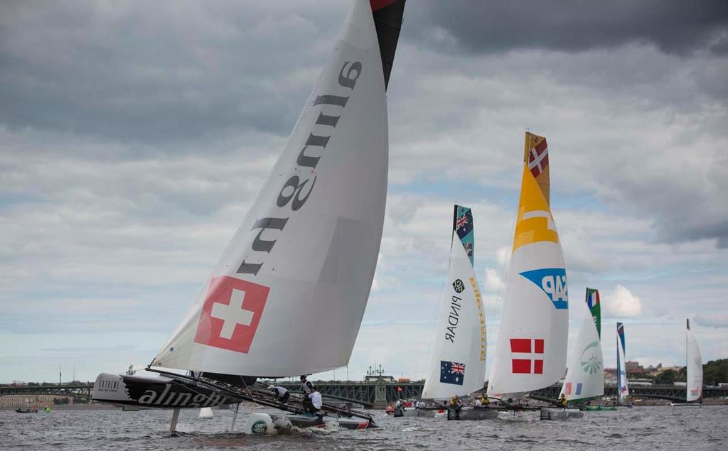 Alinghi fly a hull as they race downwind during the days opening race. 2014 Extreme Sailing Series, Act 4 © Lloyd Images/Extreme Sailing Series