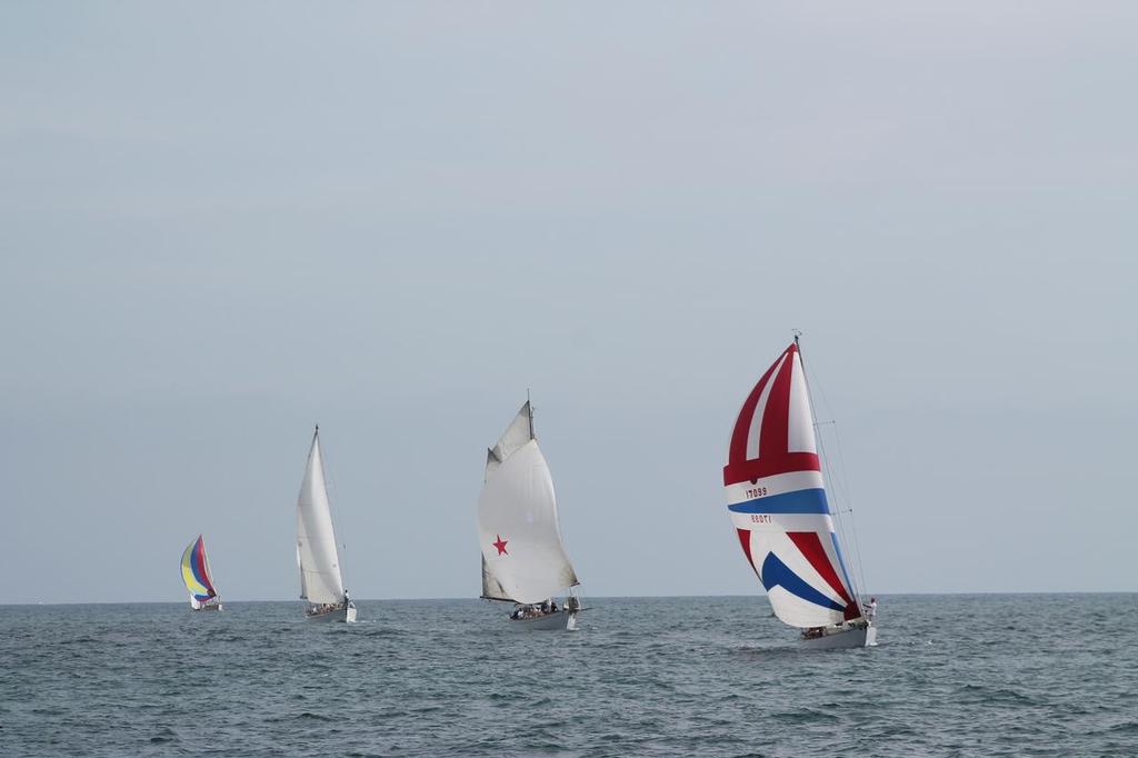Tom Zetlmaier's Rhodes sloop leads the way photo copyright Andy Kopetzky taken at  and featuring the  class