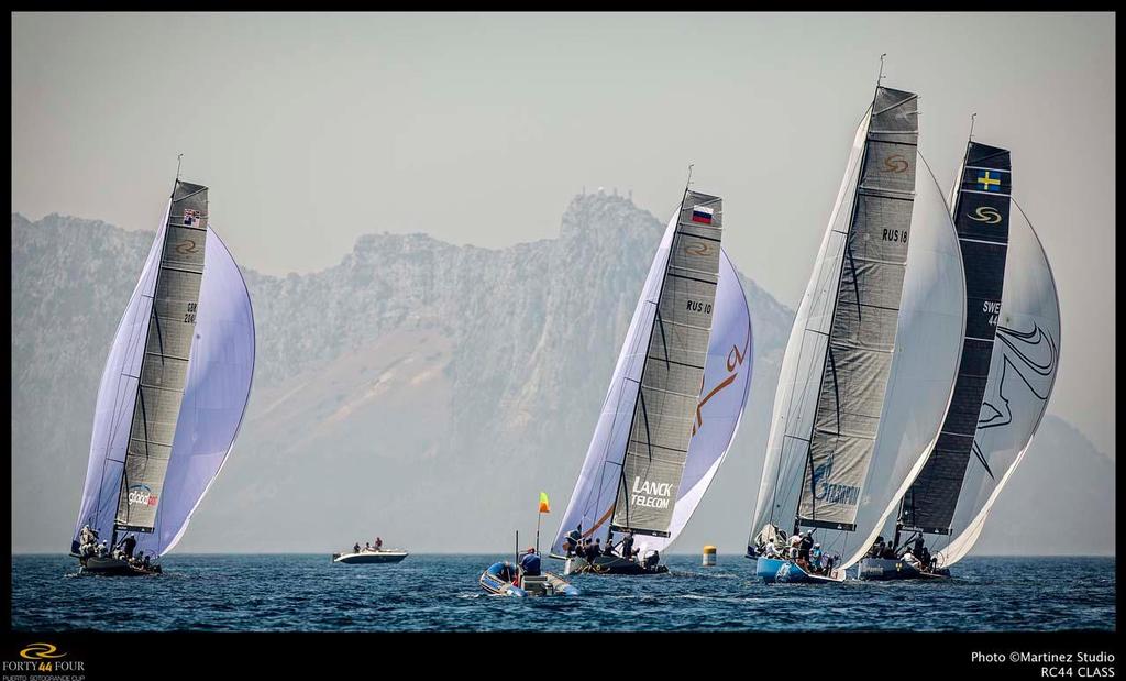 Fleet racing close to Gibraltar - 2014 RC44 Puerto Sotogrande Cup, day 3 photo copyright RC44 Class/MartinezStudio.es taken at  and featuring the  class