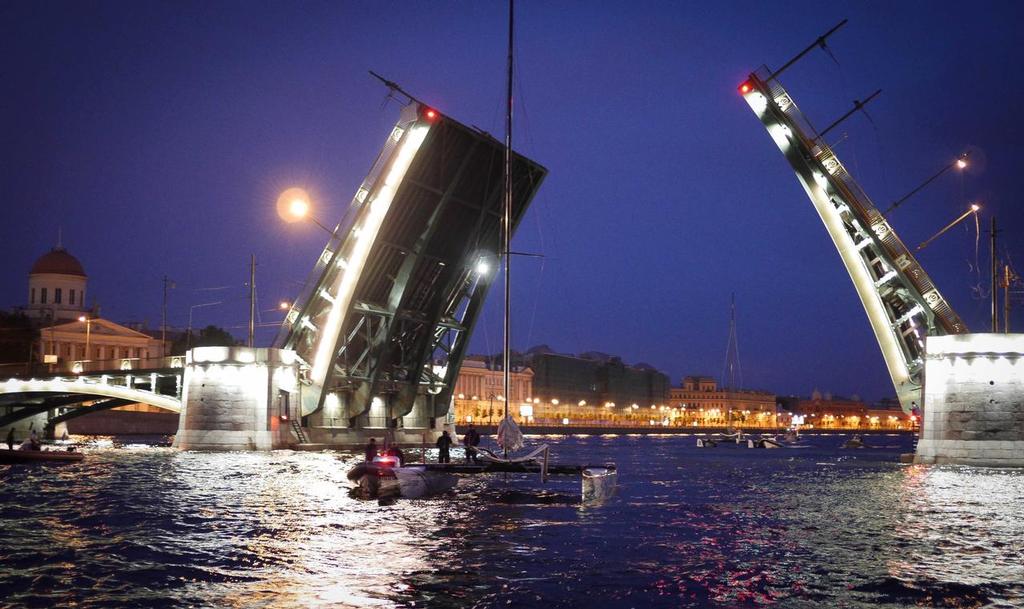 Emirates Team New Zealand in the mid night convoy taking the fleet of yachts up the Neva River into the heart of St Petersburg in preparation for racing in Act 4 of the Extreme Sailing Series in St Petersburg, Russia photo copyright Hamish Hooper/Emirates Team NZ http://www.etnzblog.com taken at  and featuring the  class