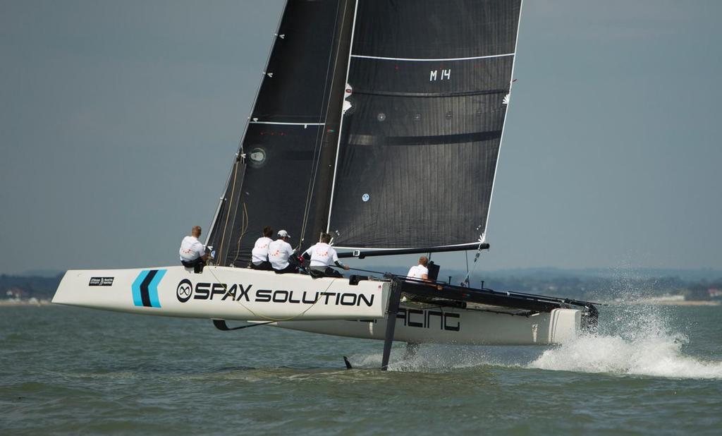 Team Spax Solution was today the second boat to cross the line on at the JP Morgan Asset Management Round the Island Race 2014. © Th.Martinez/onEdition