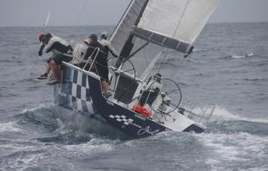 Queensland IRC Championship. Black Jack Too leads the fleet in Race 1 as the wind builds ahead of the rain squall. photo copyright Tracey Johnstone taken at  and featuring the  class