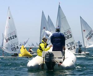 On-water umpires monitor racers photo copyright Rich Roberts taken at  and featuring the  class