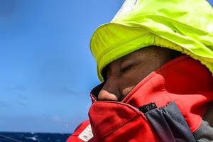Kong Chen Cheng enjoys a quick break on deck. photo copyright Dongfeng Race Team taken at  and featuring the  class