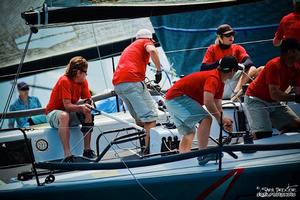 Skipper Helmut Jahn (holding tiller) and his team on Flash Gordon 6 had a strong final day and moved from third to second in the overall standings. photo copyright Sarah Proctor taken at  and featuring the  class