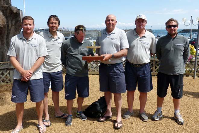 Half Ton Classics Cup Champions Peter Morton (third from right) and his crew of Swuzzlebubble with the trophy. © Fiona Brown http://www.fionabrown.com