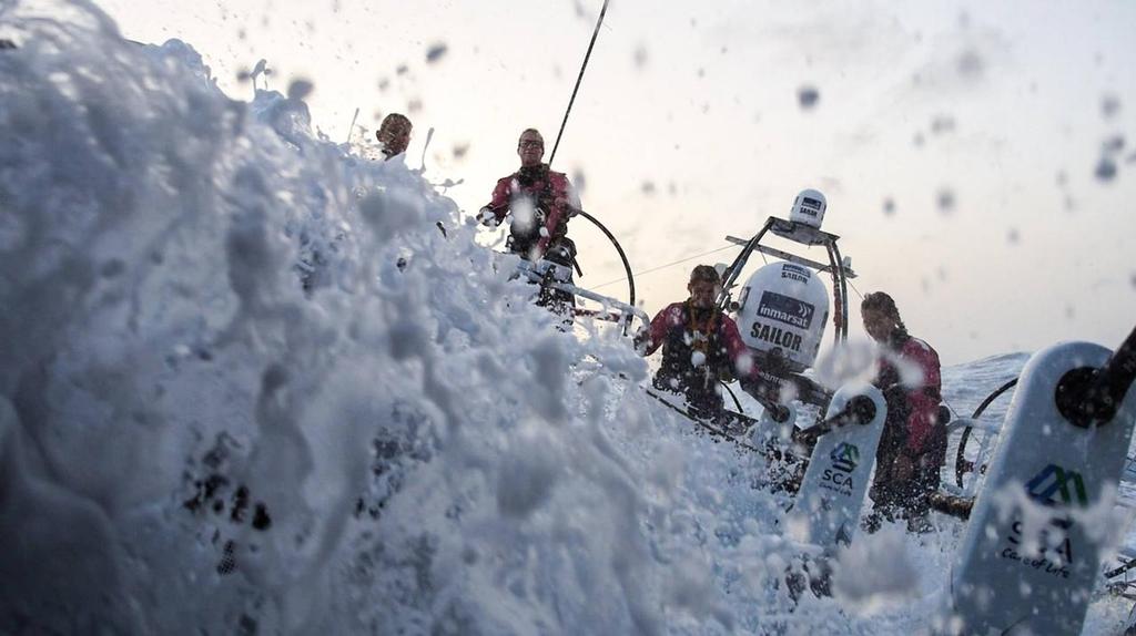 Water crashes over the boat as the girls send it down wind on Sunday morning in the Around Canary Race - Team SCA - Around Canaries 2014 © Team SCA
