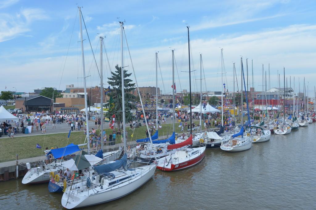 An estimated 100,000 sailing fans and families flocked to Port Huron to attend festive pre-race activities, while more than 2500 sailors claimed their team’s dock space (or raft-up position) on the Black River prior to the start.  - Bell’s Beer 90th Consecutive Bayview Mackinac Race 2014 photo copyright Martin Chumiecki taken at  and featuring the  class
