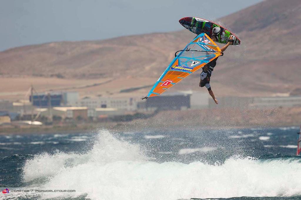 Ojeda one handed - 2014 PWA Pozo World Cup / Gran Canaria Wind and Waves Festival photo copyright  Carter/pwaworldtour.com http://www.pwaworldtour.com/ taken at  and featuring the  class
