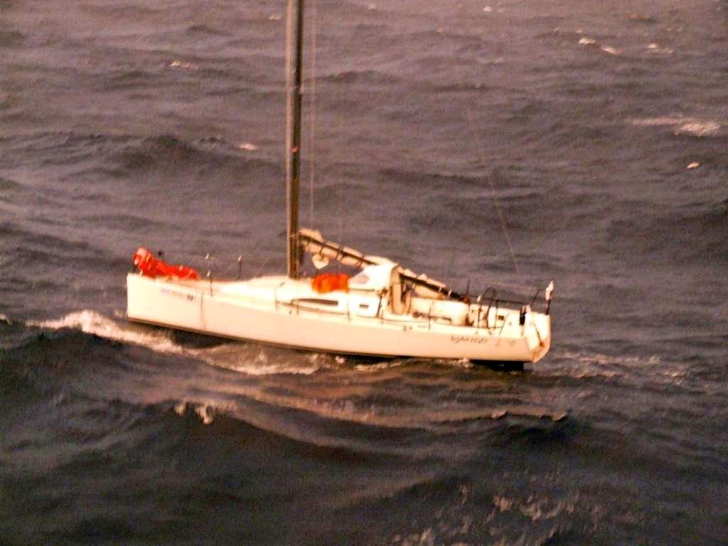 The stricken yacht Django viewed from HMNZS Otago photo copyright New Zealand Defence Force taken at  and featuring the  class