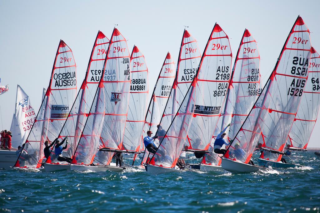The 29er fleet punch off the line in the first heat of the final days racing. © Andrew Gough