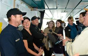 Django skipper Ben Costello with crewmates Bex Heikema and Andrew Cooke being interviewed on the bridge. - Django crew arrive ashore at Devonport Naval Base July 9, 2014 photo copyright New Zealand Defence Force taken at  and featuring the  class