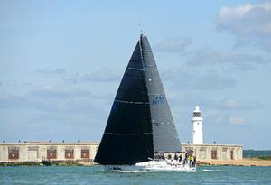 Eric De Turkheim, A13 Teasing Machine (France Green) heads out the Solent past Hurst narrows for the offshore race - 2014 Brewin Dolphin Commodores' Cup photo copyright Rick Tomlinson / RORC http://www.rorc.org taken at  and featuring the  class