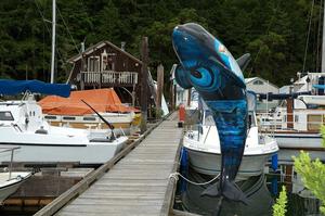 Artwork adorns docks and boathouses throughout the marina. photo copyright Deane Hislop taken at  and featuring the  class