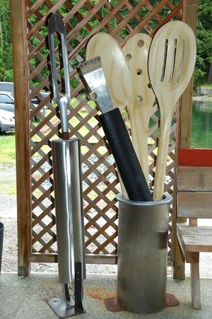 Oversize kitchen utensils outside the café. 
 
 photo copyright Deane Hislop taken at  and featuring the  class