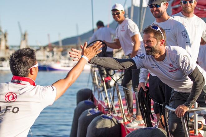 November 05, 2014. Pascal Bidégorry greets Liu Ming, aka Leo, at their arrival to the pontoon. Dongfeng Race Team was second to Abu Dhabi Ocean Racing after Leg one from Alicante to Cape Town. - Volvo Ocean Race 2014-15 ©  Ainhoa Sanchez/Volvo Ocean Race